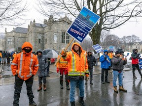 Westmount blue collar workers demonstrate outside city hall