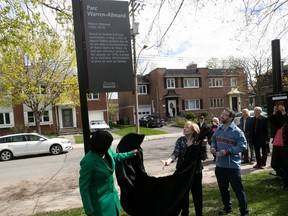 The widow of Warren Allmand, Rosemarie Nolan Allmand, and their son Patrick (centre) inaugurate Warren Allmand Park in N.D.G. on Friday May 5, 2023 with Côte-des-Neiges—Notre-Dame-de-Grâce borough mayor Gracia Kasoki Katahwa, left.