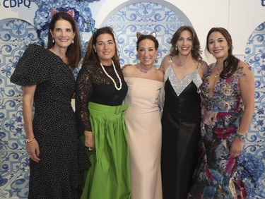 From the left: Bal des Tannants co-presidents Isabelle Marcoux and Kim Thomassin, Renée Vézina, rresident, the Montreal Children's Hospital Foundation and the co-chairs of the Partnership Committee Bal de Tannants for The Children's Véronique Black and Sharon Stern at the Bal des Tannants in the Dorval area of Montreal on Friday, May 12, 2023. The event, in which guests were invited to show up with childish accents in their dress as a way to let their 'inner brats' show, was put on by the Montreal Children's Hospital Foundation and held in Starlink Aviation's hangar.
