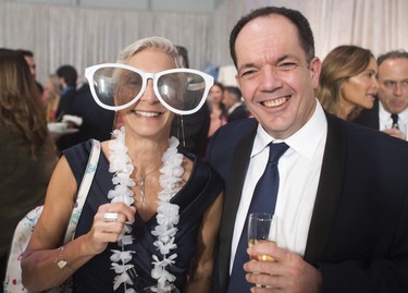 Lucie Blanchet of Banque Nationale and Louis Marcotte of Intact Insurance at the Bal des Tannants for the Children's in the Dorval area of Montreal on Friday, May 12, 2023. The event, in which guests were invited to show up with childish accents in their dress as a way to let their 'inner brats' show, was put on by the Montreal Children's Hospital Foundation and held in Starlink Aviation's hangar.
