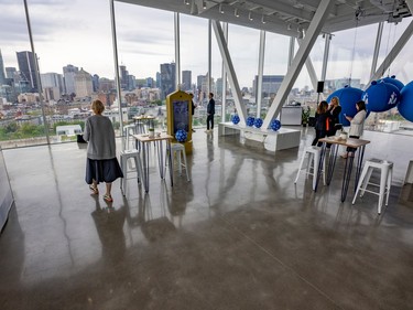 Visitors arrive at the reception level prior to the inauguration of the Port of Montreal Tower Monday May 15, 2023.