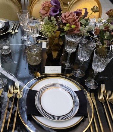Elaborate table settings at a fundraising dinner