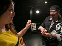 Montreal Fringe Festival director Amy Blackmore helps Jason Acoca with a magic trick Tuesday May 30, 2023 at the MainLine Theatre.