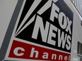 A Fox News channel sign is seen on a television vehicle outside the News Corporation building in New York City, in New York, U.S. November 8, 2017.