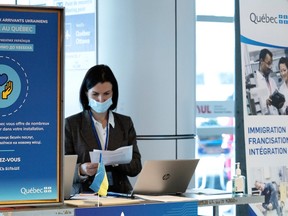 A booth at Pierre Elliott Trudeau airport is staffed to greet potential Ukrainian refugees is seen in Montreal on April 6, 2022.