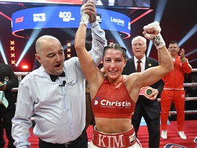Montreal boxer Kim Clavel celebrates her victory over Naomi Arellano Reyes in the main event on Friday, May 12, 2023 at Place Bell in Laval.