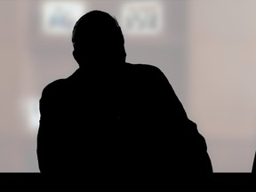 A businessman in silhouette