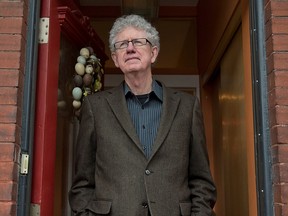 Documentary film director Brian McKenna poses for a photograph at his home in Montreal in 2013.