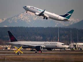The Air Canada pilots group says it has triggered an option to launch negotiations around a new collective agreement a year early after WestJet's recent pay hike. An Air Canada flight taxis to a runway as a WestJet flight takes off at Vancouver International Airport, in Richmond, B.C., on Friday, March 20, 2020.
