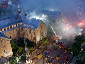 Overhead view of firefighters battling a blaze at a former monastery in Montreal
