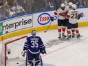 Panthers players celebrate after scoring a goal against Maple Leafs goalie Ilya Samsonov during second-round playoff action in Toronto this month.