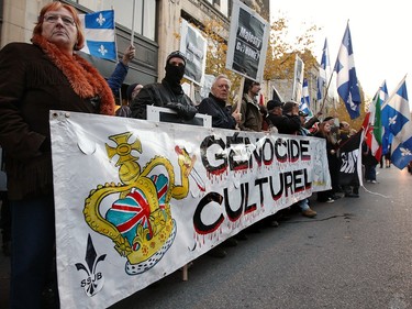 Anti-monarchy protesters near the Black Watch armoury, during a visit by Prince Charles and Camilla, Duchess of Cornwall, in Montreal in 2009.