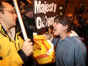 Susan Reny gives a mouthful to a anti-monarchy demonstrators gathered outside the Black Watch armoury to protest a visit by Prince Charles on Nov. 10, 2009.