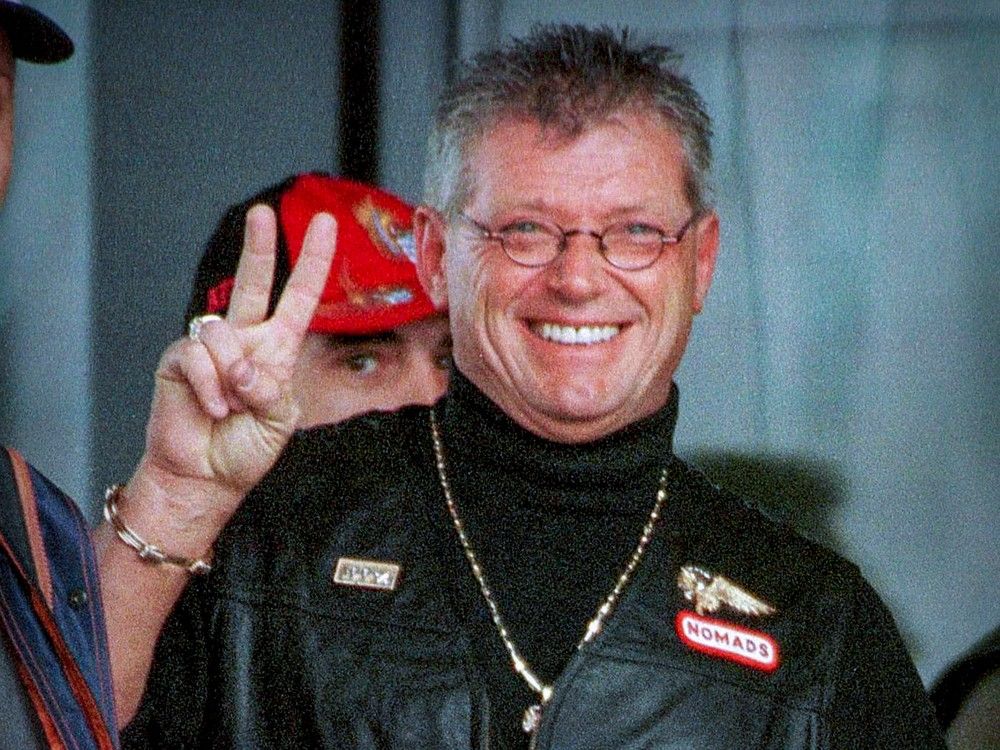Photographic Memory: Hells Angels boss flashes a peace sign