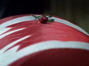 A lone red rose on Pierre Elliott Trudeau's casket.