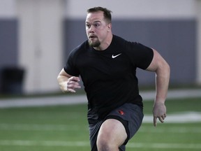 Oregon State football player Simon Sandberg participates in a position drill at the school's NFL Pro Day, Monday, March 13, 2023, in Corvallis, Ore.