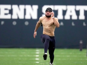 Penn State defensive back Jonathan Sutherland runs the 40-yard dash during the NCAA college football team's NFL Pro Day in State College, Pa., Friday, March 24, 2023.