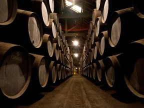 A tawny port is aged in wood until bottled, while a vintage port ages in both barrel and bottle.