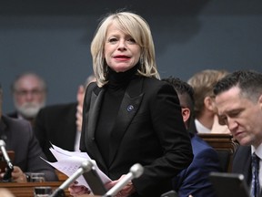 Quebec Tourism Minister Caroline Proulx presents legislation that would regulate the rental of short-term residences, at the legislature in Quebec City, Tuesday, May 9, 2023. The legislation would make it illegal for anyone to advertise a short-term rental without including the certificate number and expiry date.