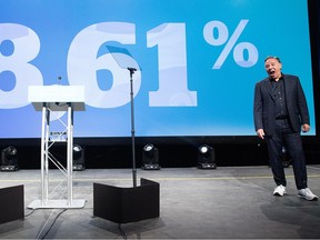 François Legault expresses surprise as a giant screen shows 98.61% support in a confidence vote