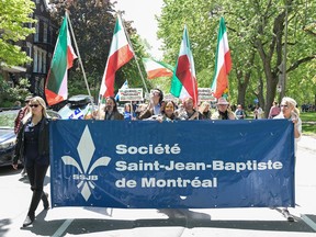 People take part in a march to celebrate Journée nationale des Patriotes in Montreal, Monday, May 22, 2023.
