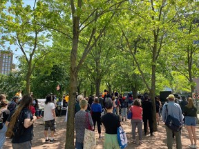 People take part in a rally to denounce racial profiling and police discrimination while also recognizing the third anniversary of the death of George Floyd, in Montreal on Saturday May 27, 2023.