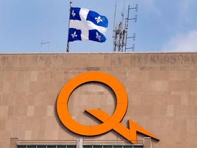 A Hydro-Québec logo is seen on its head office building in Montreal, Thursday, Feb. 26, 2015.
