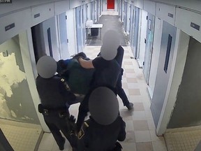 A screen shot of the video footage filmed by a security camera inside Port-Cartier Institution in Quebec of guards' attempt to get inmate Nick Dinardo to lock up in a cell. Dinardo's legal team obtained it from the CSC in April.
