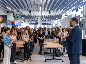 Novartis Canada head Andrea Marazzi  addresses staff at the Swiss pharma giant's new office space at Place Gare Viger in Old Montreal on Wednesday.