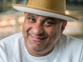Closeup of a smiling Russell Peters