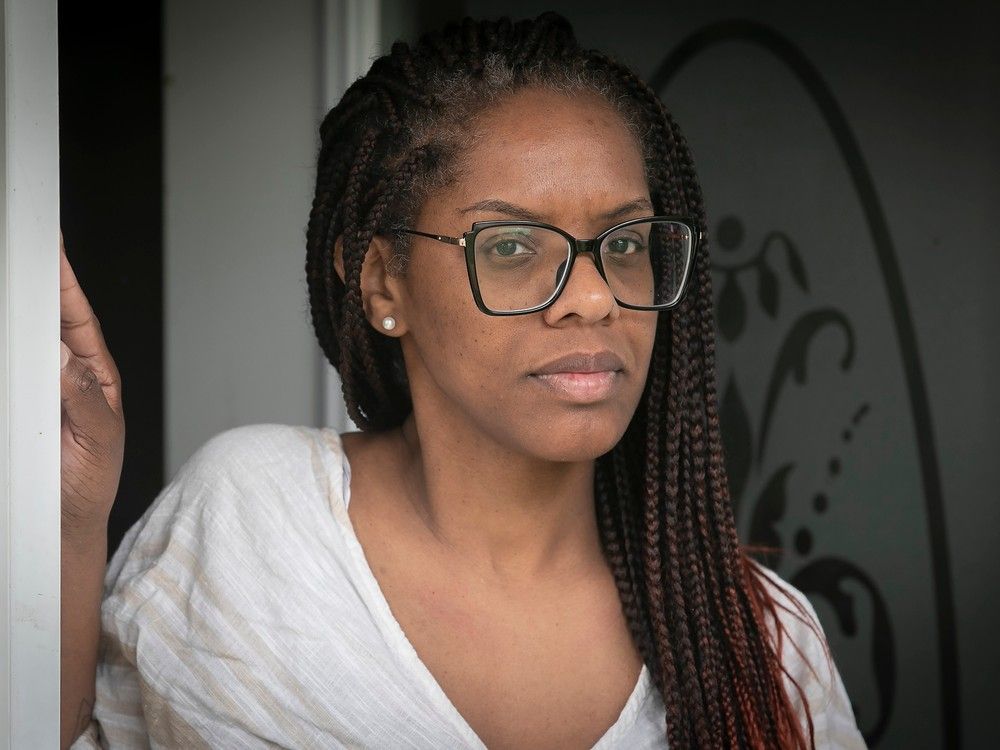 Daiana Dos Santos is seen at the front door of her home in St-Eustache on Tuesday June 6, 2023.