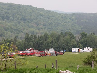 Fire crews parked at Snider's Tent And Trailer Park near Centennial Lake, around 150 kilometres west of Ottawa, June 5, 2023.