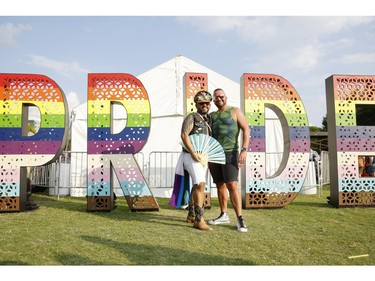 Two men are seen posing for a photo at Bicentennial Capitol Mall State Park during Nashville Pride 2023 on June 24, 2023 in Nashville, Tenn.
