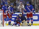 Trainer Jim Ramsay is seen helping Rangers' Mika Zibanejad in 2016. Ramsey, 58, spent more than 28 years as head athletic therapist with New York.