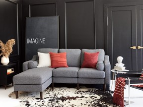A grey sofa in a living room