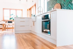 A hardwood floor in the kitchen