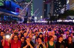 The crowd takes in the show as Ibrahim Maalouf performs the opening big blowout concert of the Montreal International Jazz Festival on June 29, 2023.