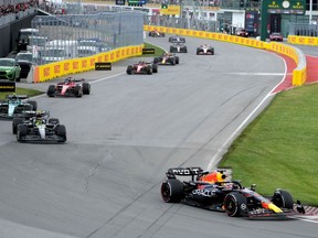 Red Bull Racing Max Verstappen, of the Netherlands, widens his lead going into a corner during Formula One auto racing action at the Canadian Grand Prix in Montreal, Sunday, June 18, 2023.