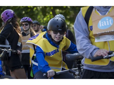 Anthony Charbonneau was anticipating his ride during the 38th Tour de l'île de Montréal in Montreal on Sunday, June 4, 2023. He was there as part of an outing by The Quebec Foundation for the Blind.