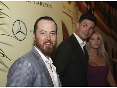 Montreal Canadiens players Paul Byron (left) and Carey Price, with his wife, Angela, at the Grand Prix Party 2023 at the Ritz Carlton on Friday, June 16, 2023.