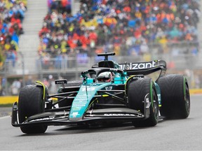 Montreal-born Lance Stroll drives his Aston Martin Aramco Cognizant car in the rain at Circuit Gilles Villeneuve during a practice session for the Canadian Grand Prix on Saturday, June 17, 2023.