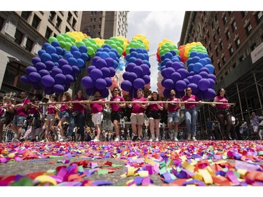 Revealers march during a the NYC pride parade on Sunday, June 25, 2023, in New York.