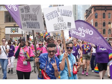 Toronto mayoral candidates walk in the Dyke Parade, on Saturday, June 24, 2023, as part of Pride Celebrations in Toronto.
