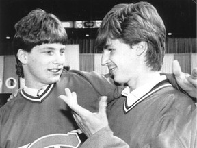 Shayne Corson and Petr Svoboda embrace in Canadiens jerseys