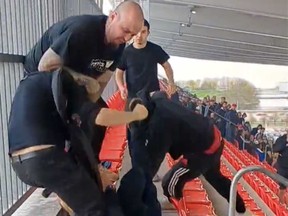 Soccer fans were seen in a video throwing punches in the stands during Tuesday's game between Toronto FC and CF Montreal.