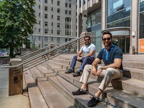 Sam and George Armoyan Jr., left to right, are seen outside the former Standard Life office at 1245 Sherbrooke St. W. in Montreal on Friday June 30, 2023.