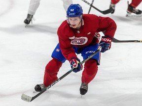 Owen Beck skates on the ice during development camp