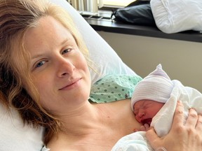 alexandra tremblay with baby henri on her chest
