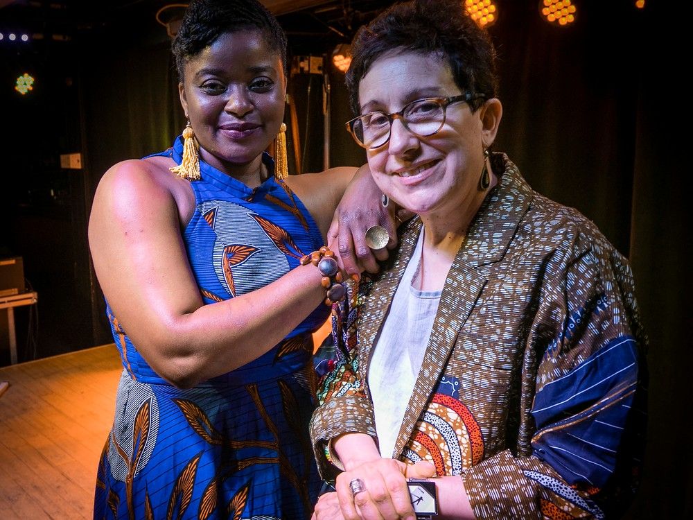 Nuits d'Afrique general manager Suzanne Rousseau, right, and musician Naxx Bitota at Club Balattou in Montreal on Monday, July 10, 2023.