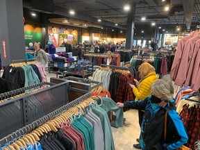 Shoppers are seen in the L.L. Bean store in the Cataraqui Centre in Kingston, Ont. in November 2022.